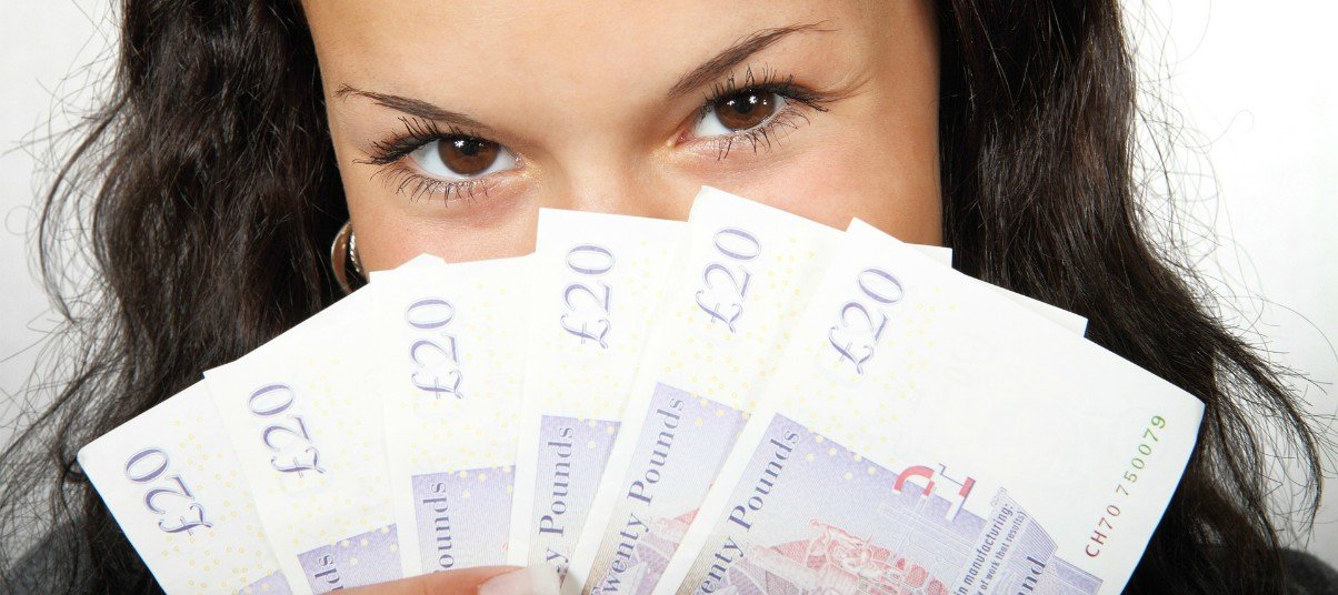 woman money British pound
